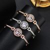 Poza cu Bratara dama, stil coreean, culoare roz aurie - argintie - aurie, material aliaj - cristal